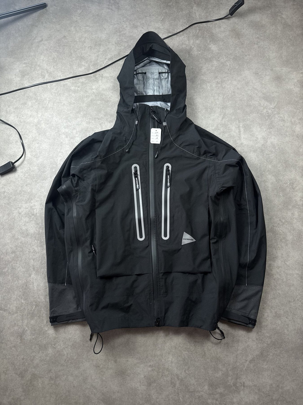 And Wander Pertex Shield Regenjacke Schwarz Gr. M