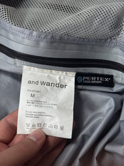 And Wander Pertex Shield Regenjacke Schwarz Gr. M