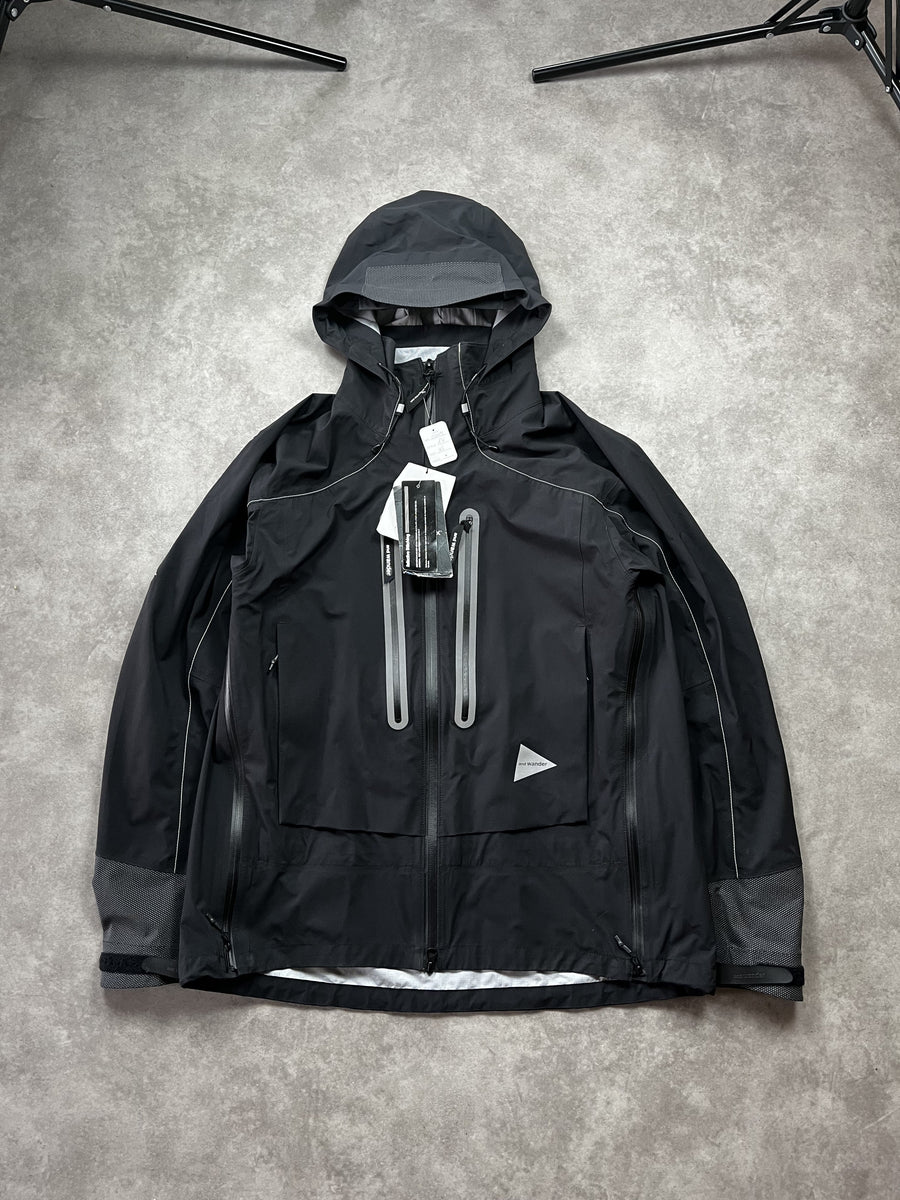 And Wander Pertex Shield Regenjacke Schwarz Gr. XL