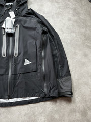 And Wander Pertex Shield Regenjacke Schwarz Gr. XL
