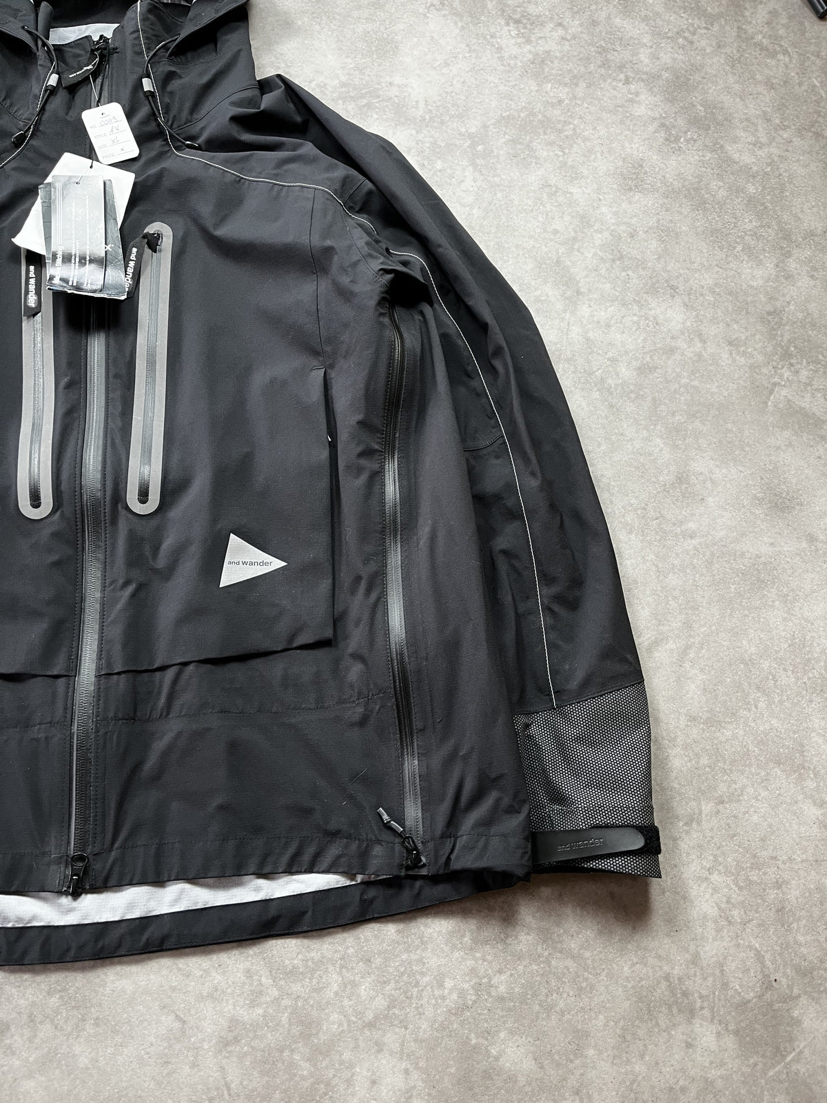 And Wander Pertex Shield Regenjacke Schwarz Gr. XL