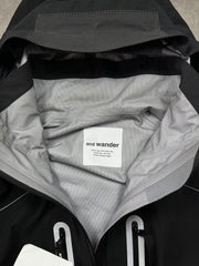 And Wander Pertex Shield Regenjacke Schwarz Gr. XL