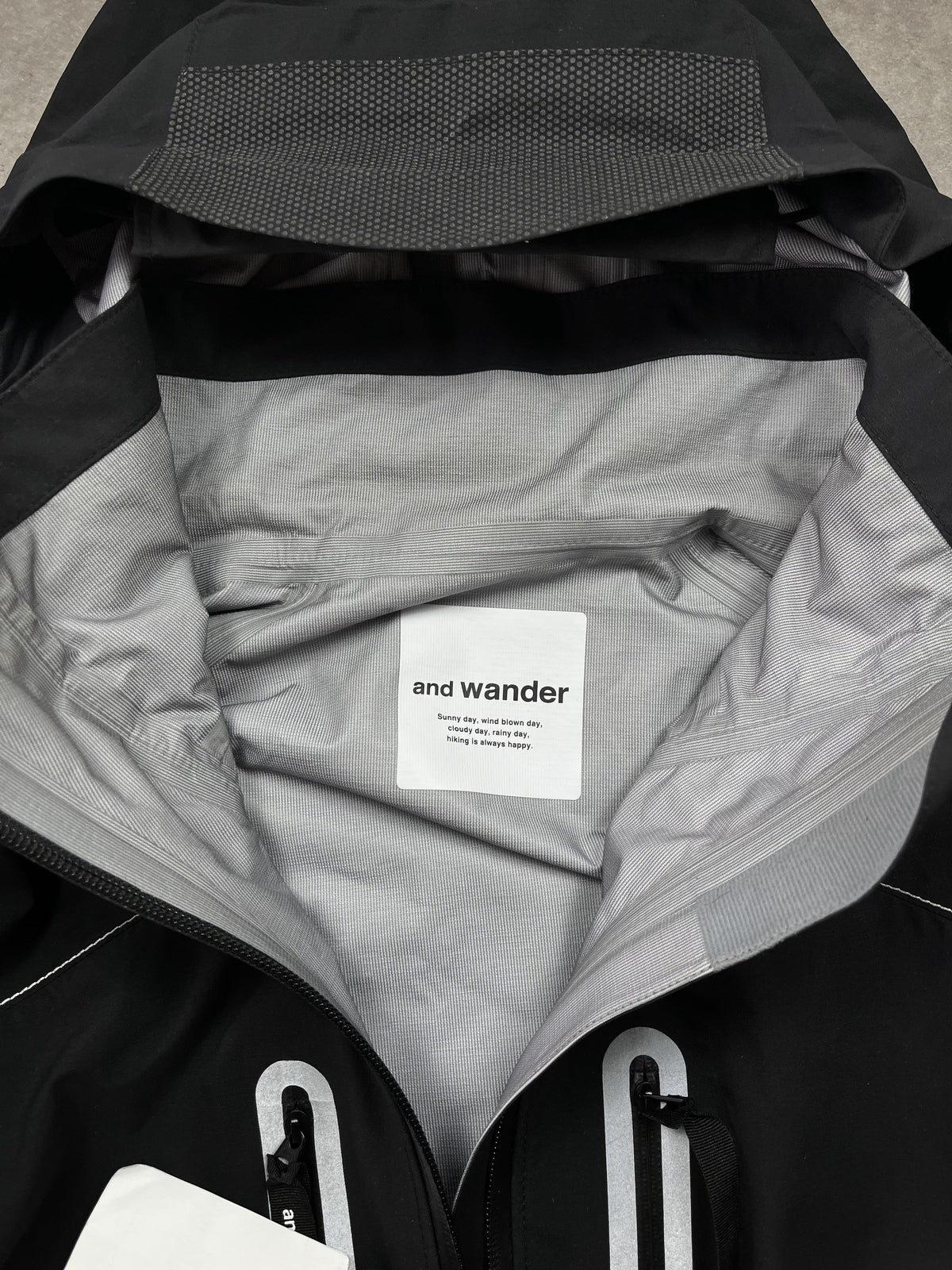 And Wander Pertex Shield Regenjacke Schwarz Gr. XL