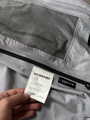 And Wander Pertex Shield Regenjacke Schwarz Gr. XL